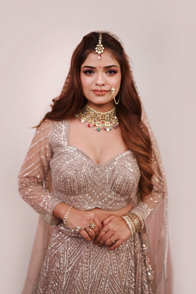 Bride with voluminous wavy hair, smoky eye makeup by Bellance Salon
